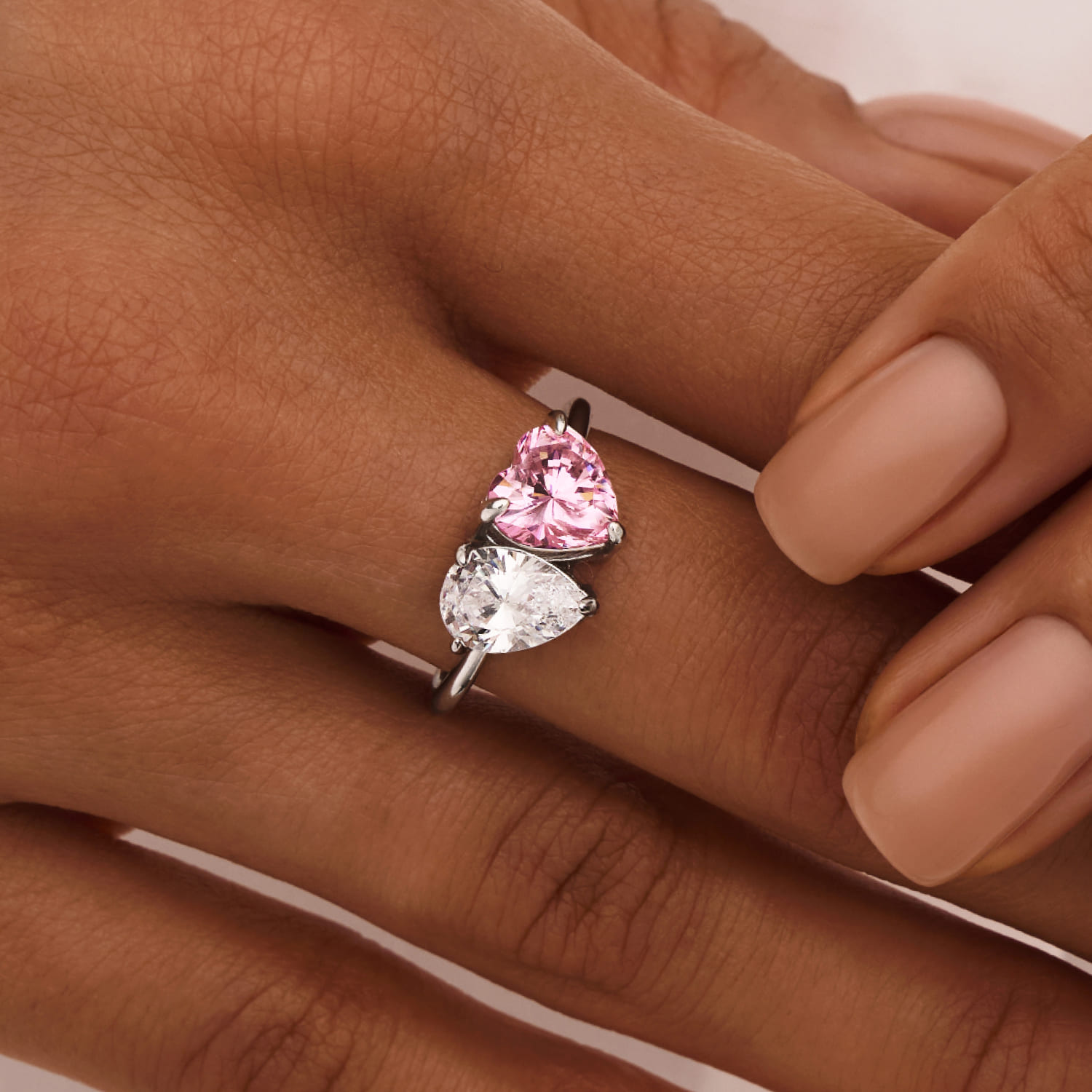 Серебряное кольцо Toi et Moi с фианитами в гранках сердце и груша