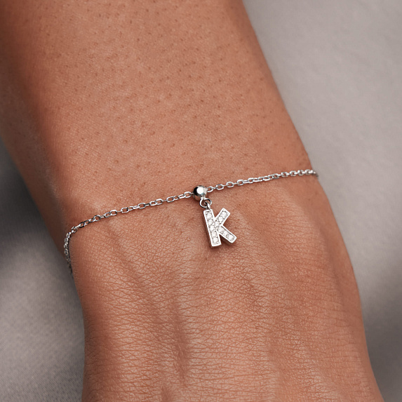 Серебряный шарм с фианитами буква K Miestilo