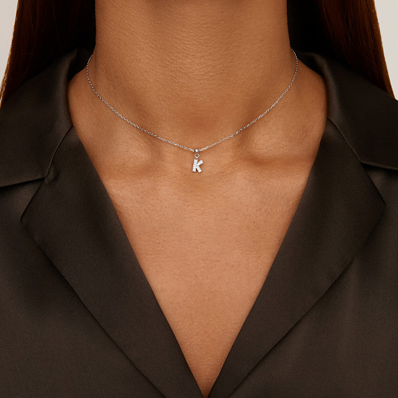 Серебряный шарм с фианитами буква K Miestilo