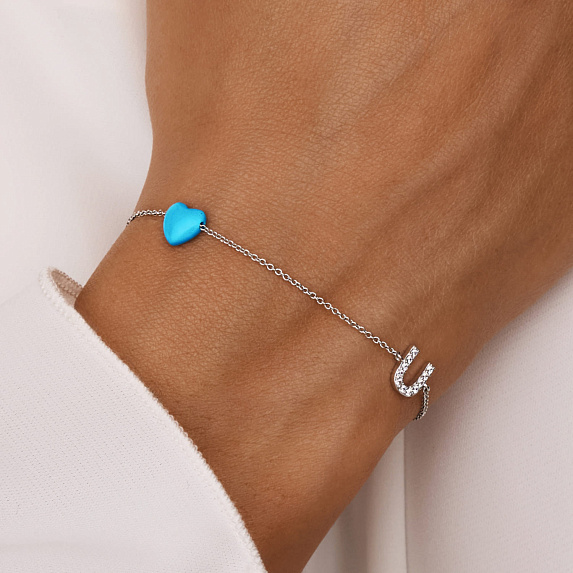 Серебряный браслет с сердцем из иск. Бирюзы и буквой U из фианитов Miestilo