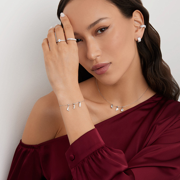 Серебряный шарм с фианитами буква L Miestilo
