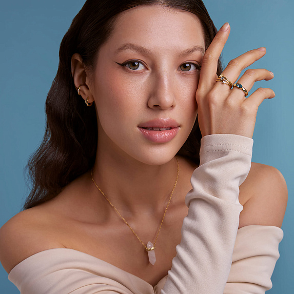 Серебряное кольцо позолоченное с фианитом в огранке багет Miestilo