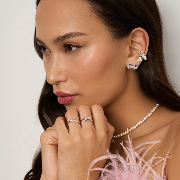 Серебряные серьги гвоздики с фианитами бант Miestilo